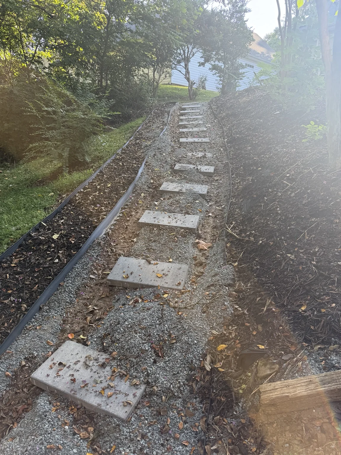 Stepping-stone walkway before hardscape renovation